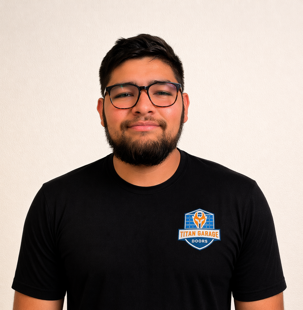 A close-up image of Aidan, a technician at Titan Garage Doors Iowa